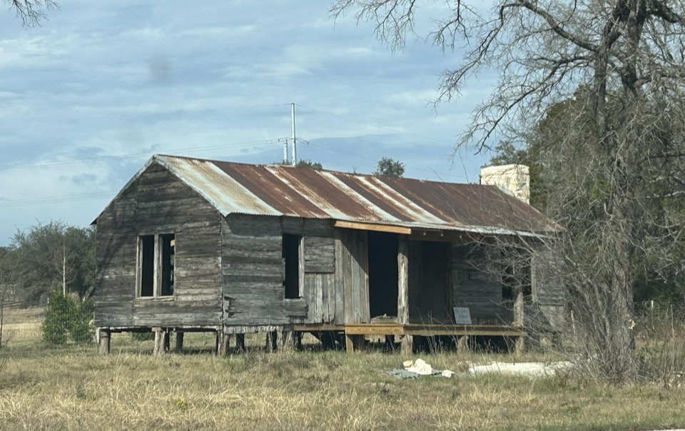 The original 1873 Gray homestead, a cedar dog-run style house