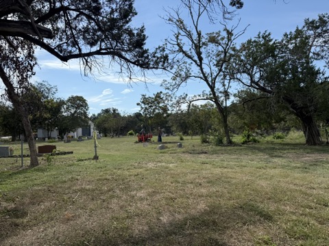 Volunteer grounds work at Nameless Cemetery